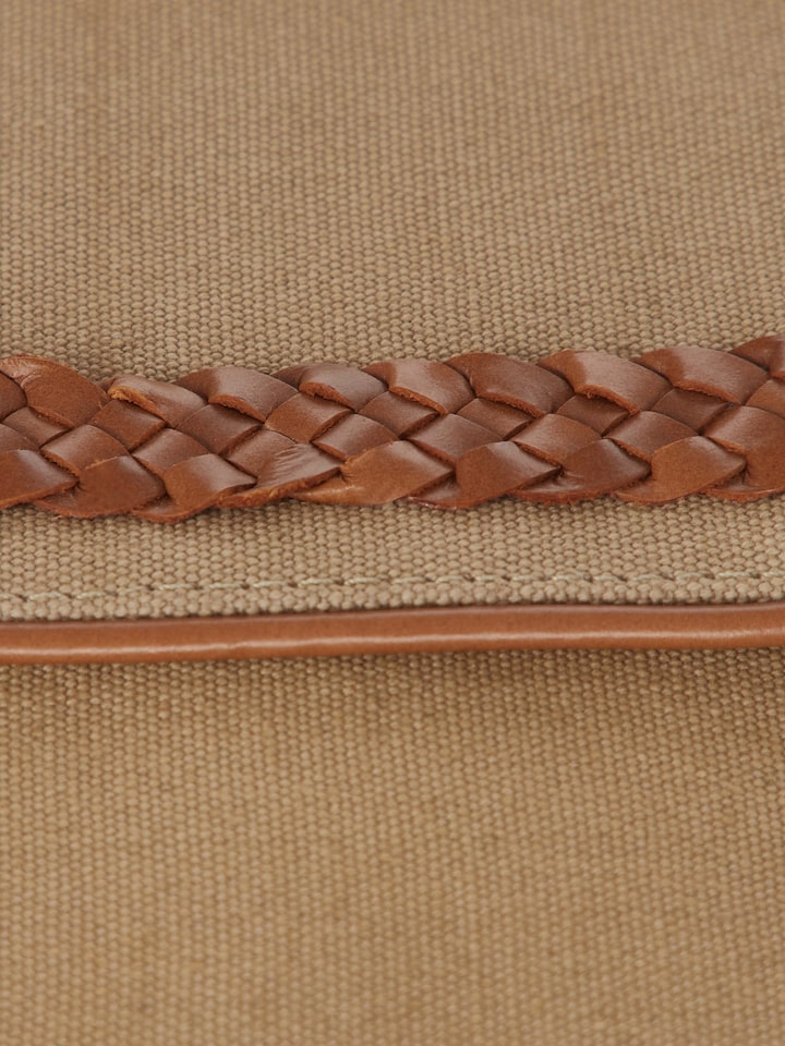 Back view of Leather Laptop Bag for MacBook 13, emphasizing the design and closure features