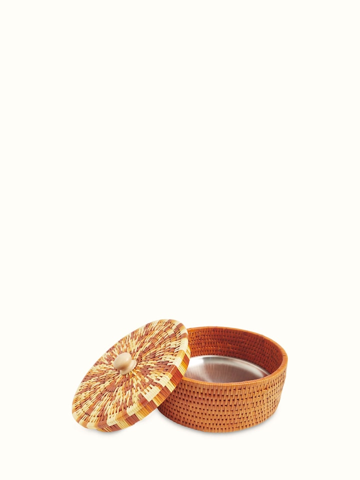Top-down view of palm leaf woven roti box in brown, featuring the textured surface and functional design