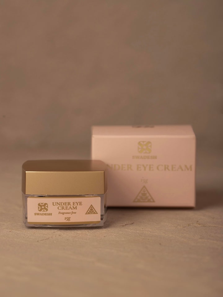 Side view of Under Eye Cream jar, showcasing the jar's shape and label.