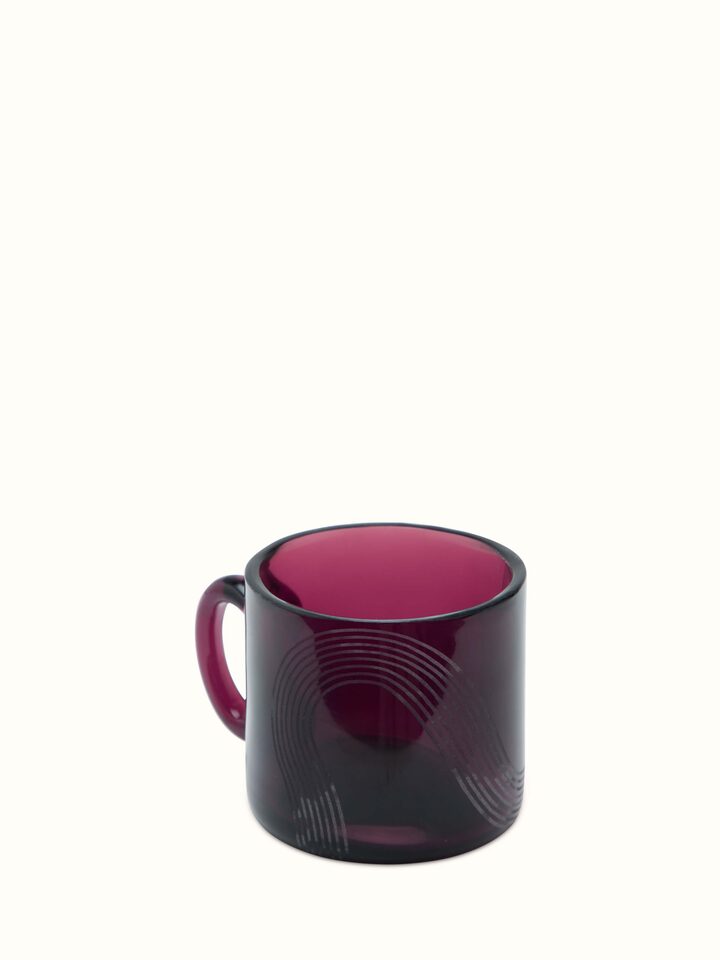 Side view of Firozabadi coloured glass teacup & saucer, showcasing the elegant shape and color.
