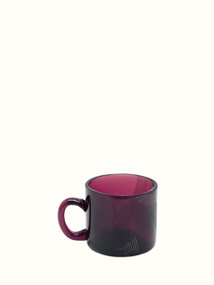 Artistic view of Firozabadi coloured glass teacup & saucer, highlighting the vibrant colors and design.