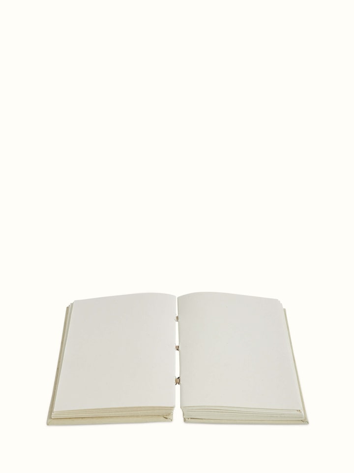 Detailed view of Warli painted paper planner brown emphasizing its unique artwork and design