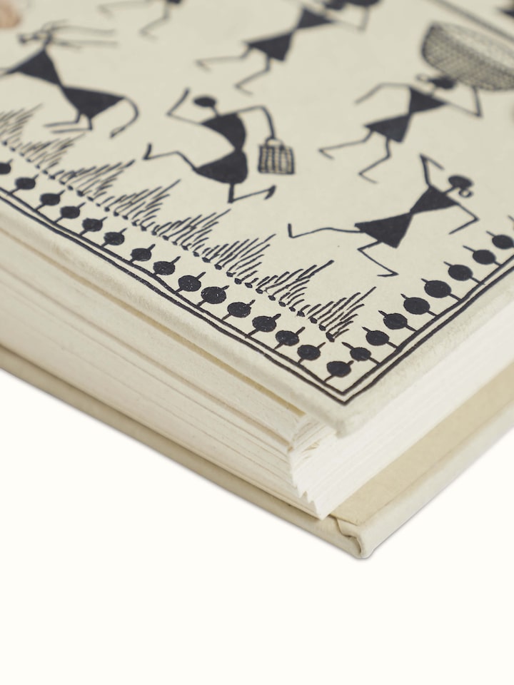 Top view of Warli painted paper planner brown showcasing its artistic cover design and texture
