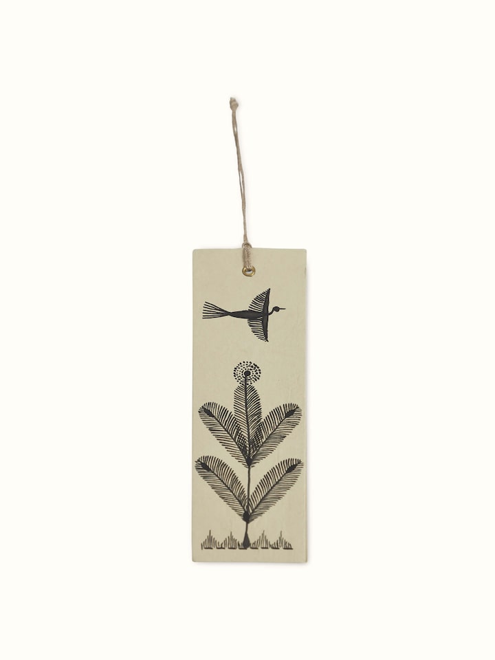 Artistic shot of Warli painted paper bookmarks in brown (2 pcs) placed together to highlight the intricate art.