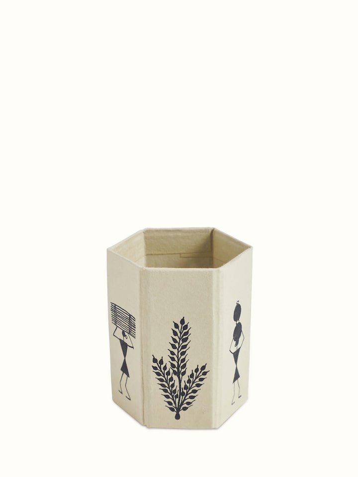 Front view of Warli Painted Paper Pen Stand in brown, showcasing traditional Warli art and detailed patterns