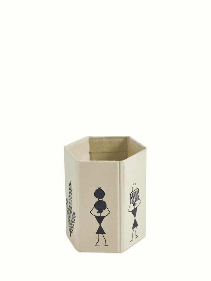 Close-up of Warli Painted Paper Pen Stand in brown, focusing on the detailed Warli art and texture