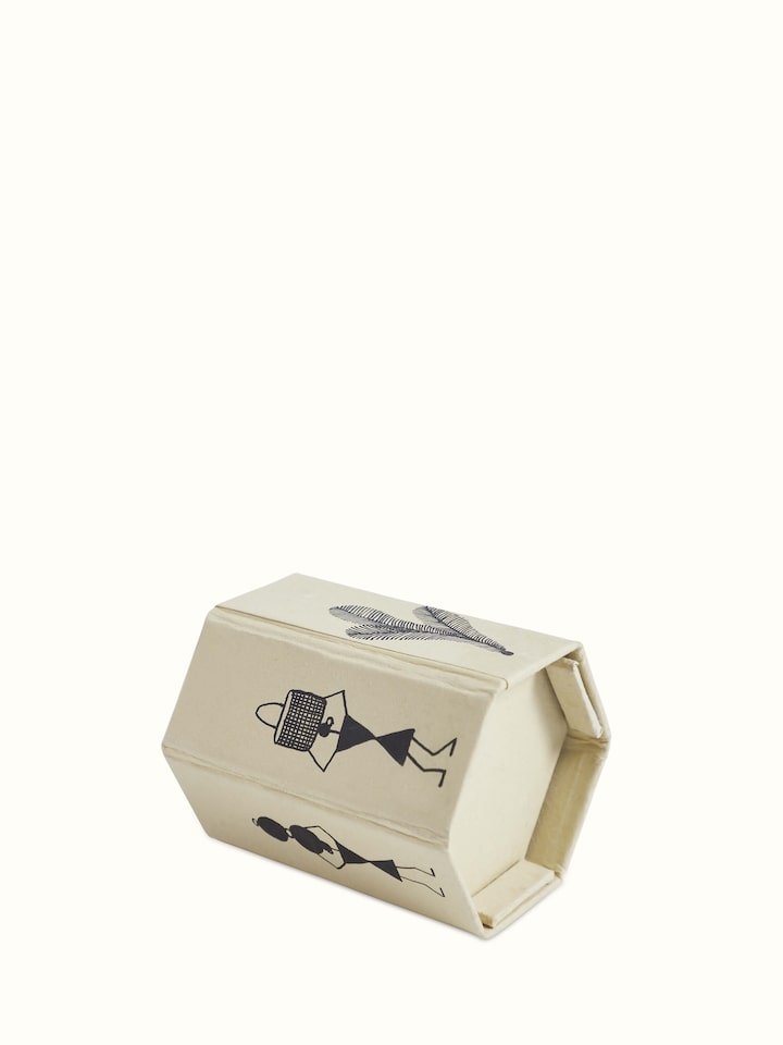 Angled view of Warli Painted Paper Pen Stand in brown, highlighting the traditional artwork and functional design