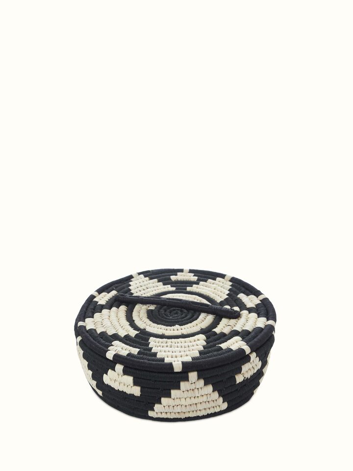 Angle view of Kanshi basketry natural fibre bread basket, showcasing the natural fiber texture