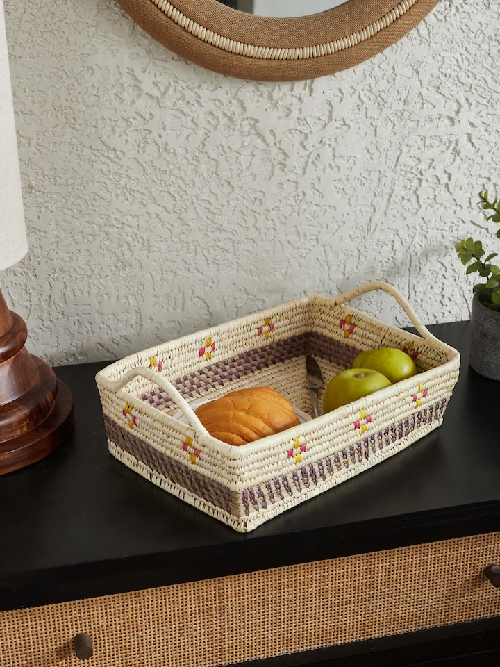 Side view of Kanshi basketry natural fibre serving tray highlighting its elegant shape.
