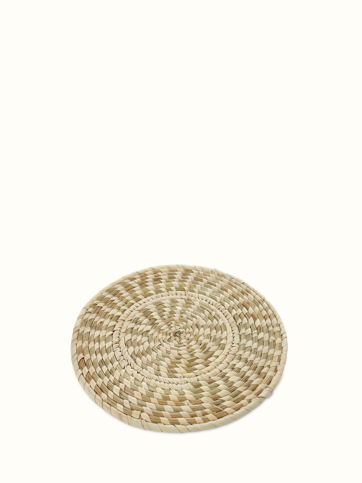 Detailed view of Kanshi basketry natural fibre trivets, showcasing their intricate weave and natural texture.