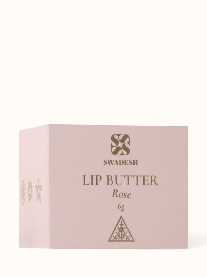 Top view of Lip Butter Rose emphasizing the jar’s lid and overall product presentation.
