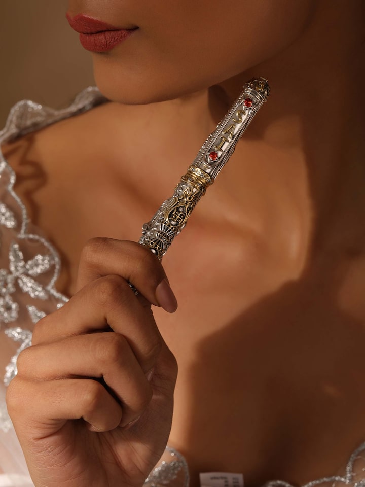 Side view of Lord Sai Baba Silver Smithing Pen showcasing the elegant design and detailed silver engraving.