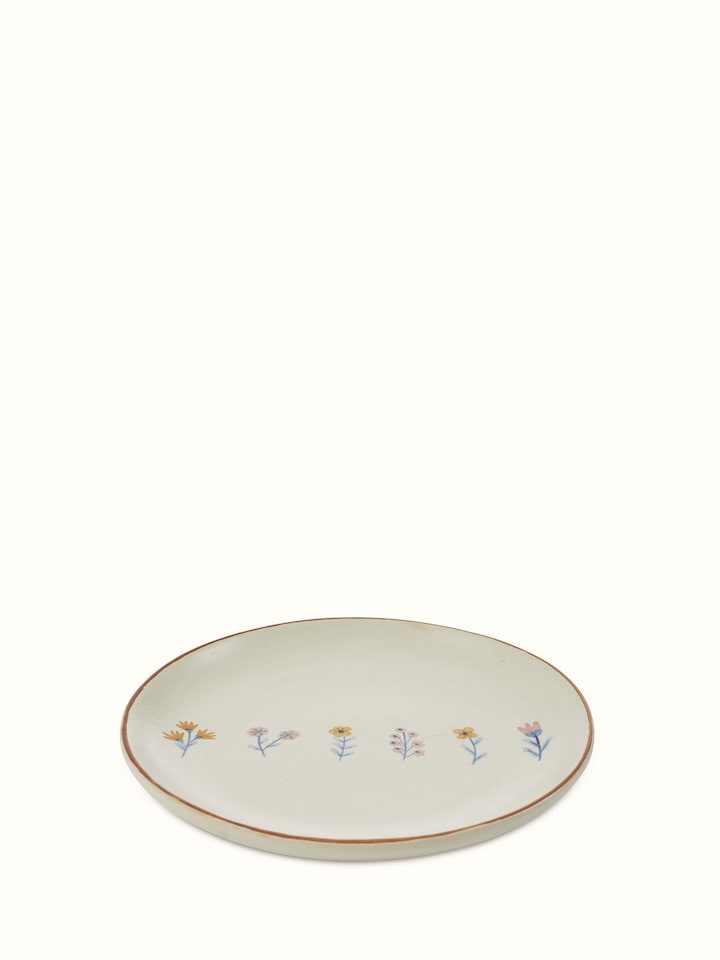 Close-up view of Studio pottery ceramic side plates in beige (4 pcs) focusing on craftsmanship