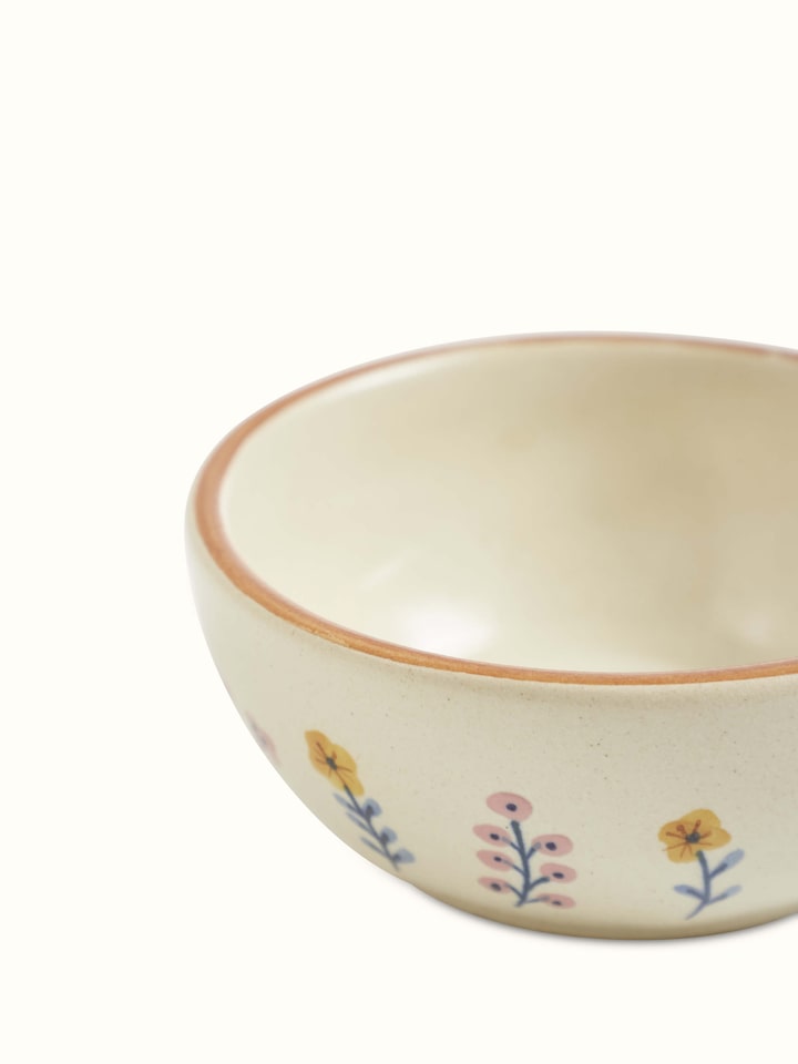 Close-up view of Studio Pottery Ceramic Dinner Bowls in Beige, highlighting the smooth ceramic surface