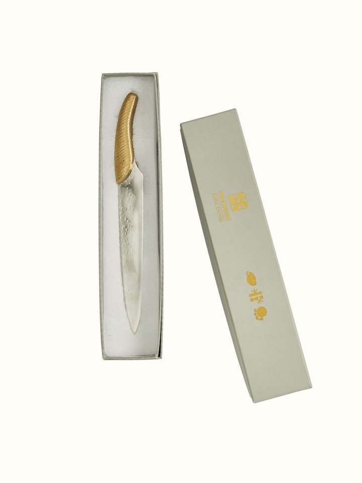 Angled view of Reha Stainless Steel Cleaver Knife showcasing ergonomic handle design