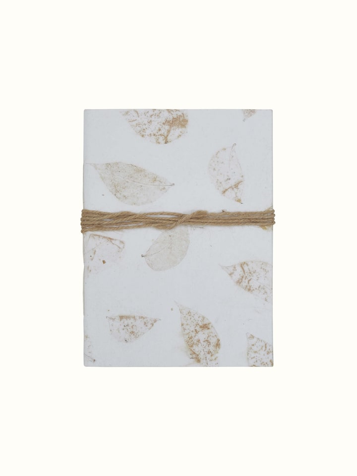 Front view of Auroville Handmade Paper Notebook with Rope in white, highlighting the notebook's texture and design.