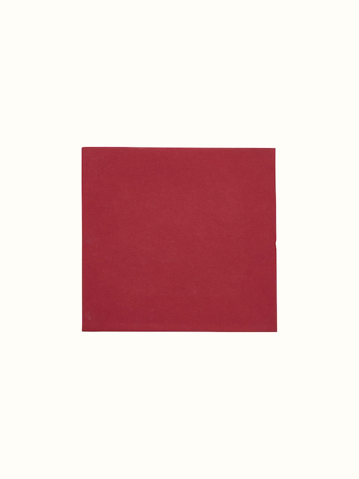 Detailed view of Auroville Handmade Paper Money Envelope in red, showcasing the quality of the handmade paper and design elements
