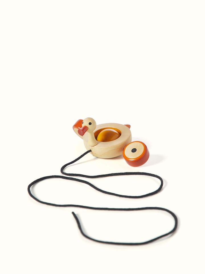 Top view of Channapatna Ivory Wood Duby Duck Toy, displaying the overall shape and details