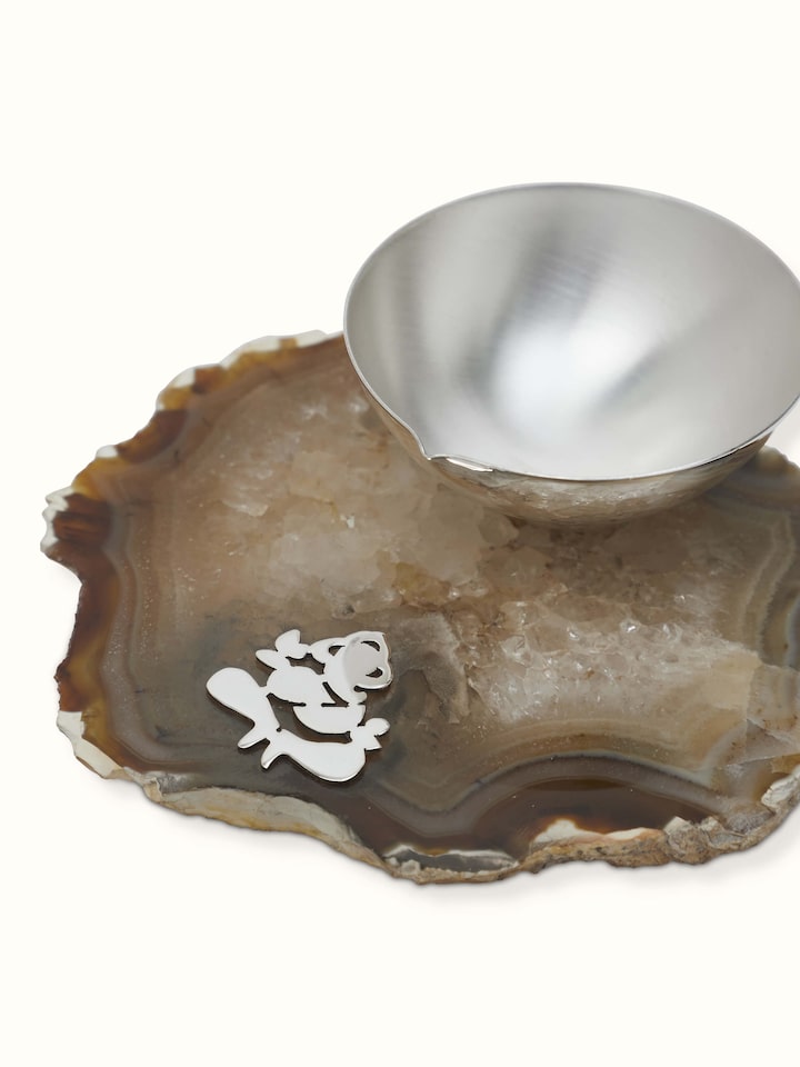 Side view of Silver Ganesh diya showcasing detailed craftsmanship and design