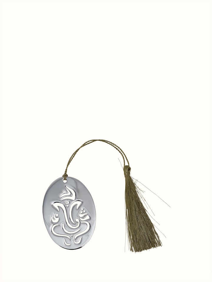 Side view of silver-plated Ganesh bookmark highlighting its intricate design and polished surface