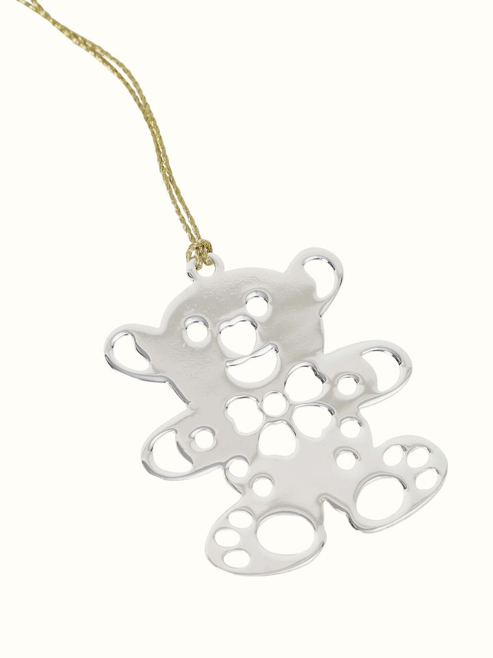 Side view of silver-plated teddy bookmark showing the detailed craftsmanship and sleek finish