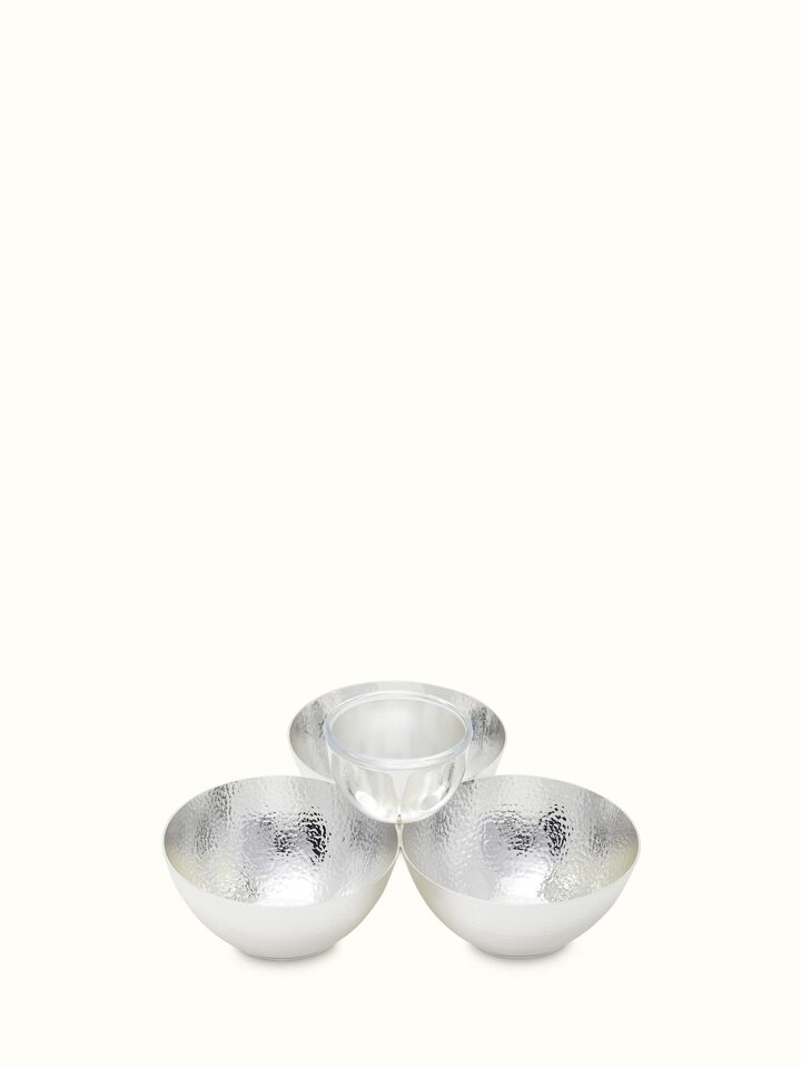 Close-up view of Silver-plated nut bowl emphasizing fine detailing and reflective surface.