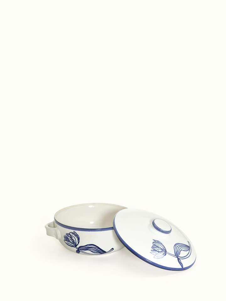 Angled view of Khurja Pottery Ceramic Roti Box, displaying the intricate design and ceramic finish