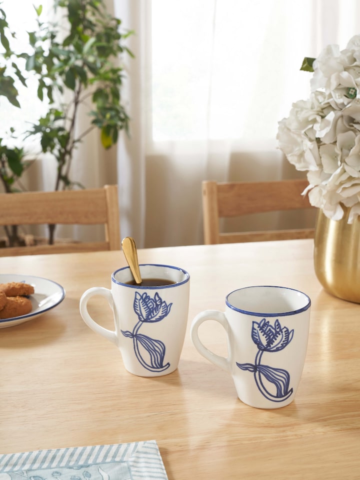 Top view of Khurja pottery ceramic coffee mugs white & blue (2 pcs) showing handles and rim details