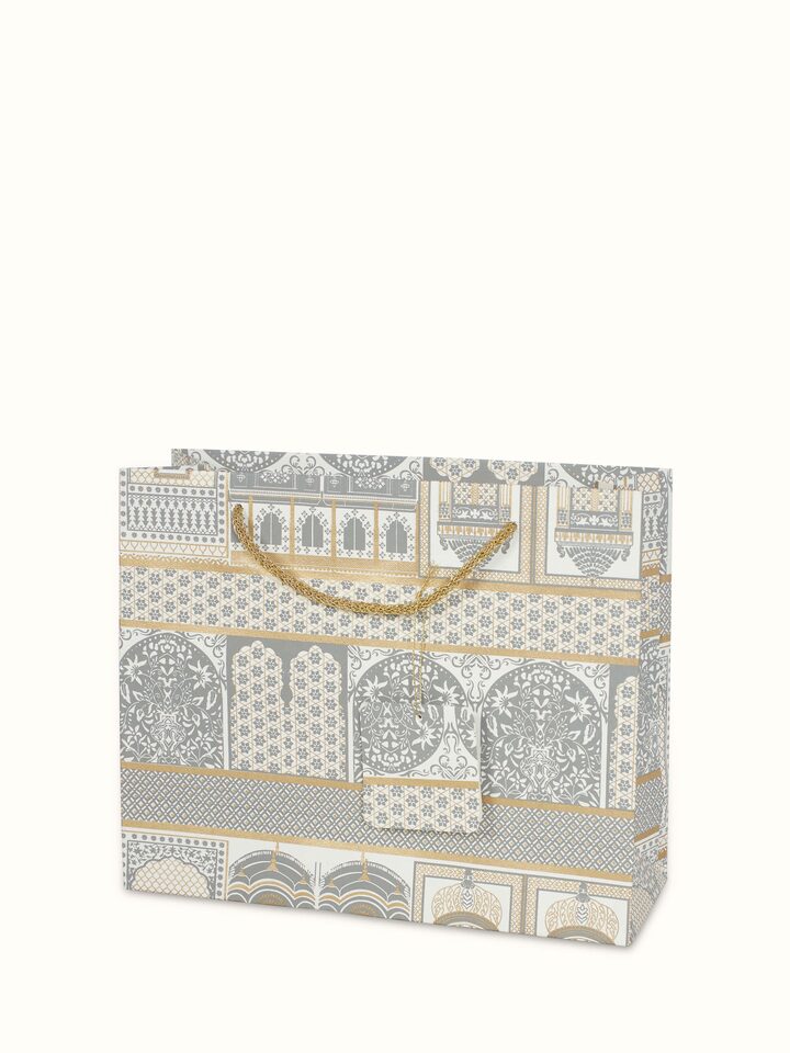 Front view of Handmade paper gift bags white (3 pcs) highlighting their versatile use.