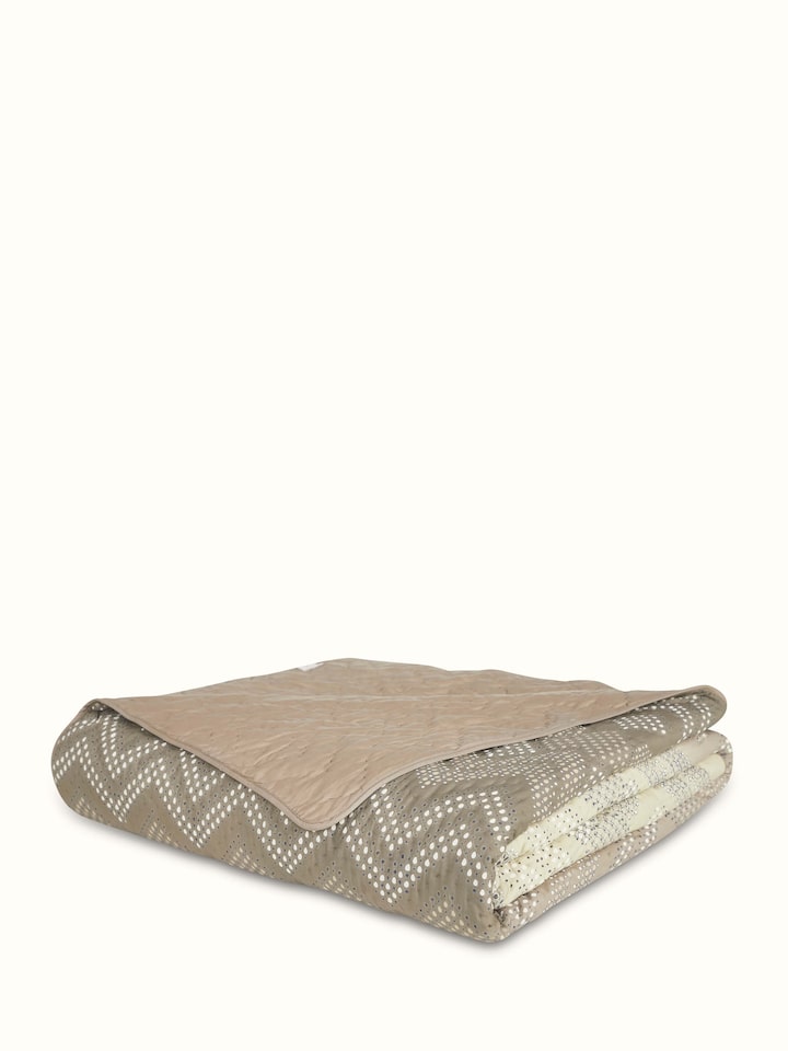 Detailed view of Rambagh green ombre geo cotton Sanganeri block printed double quilt showing the print details and texture.