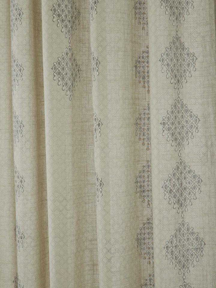 Close-up of Rambagh Light Green Modern Geo Diamond Cotton Sanganeri Block Printed Curtain emphasizing the fabric and print.