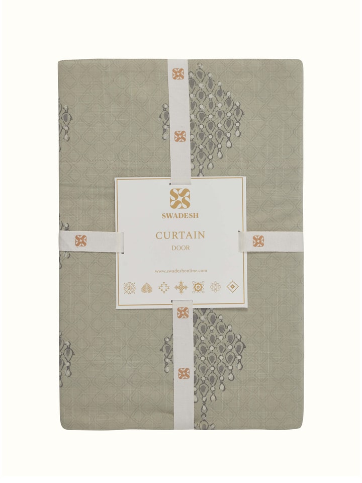 Detailed view of Rambagh light green modern geo diamond cotton Sanganeri block printed curtain (7 ft) focusing on the curtain’s pattern and texture