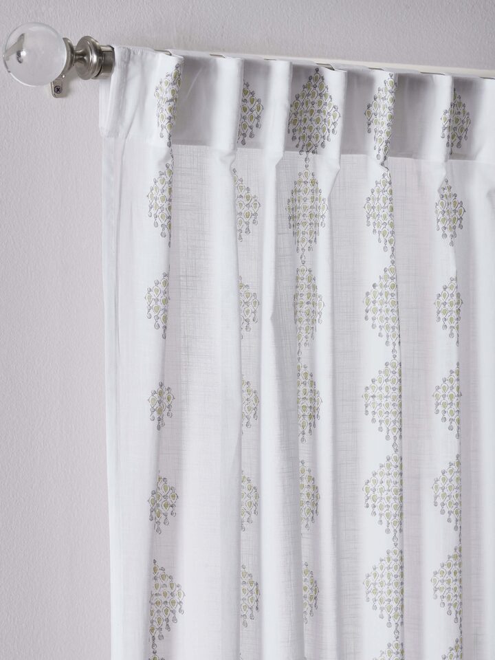Rambagh white and green modern geo cotton curtain, showing the full length and pattern