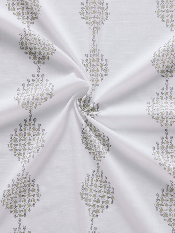 Rambagh white and green curtain displaying the modern geo pattern in natural light