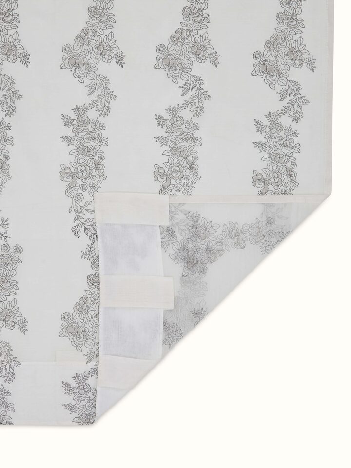 Close-up view of Shivranjini white floral stripe cotton silk Sanganeri block printed curtain (9 ft) showing the fine details of the block print and stripes.