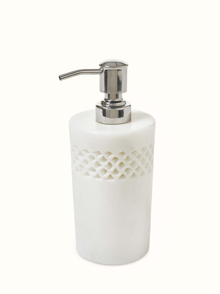Angle view of Carved Ambaji white marble soap dispenser highlighting its elegant marble texture.