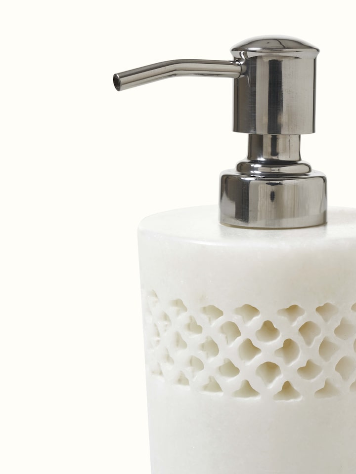 Detailed view of Carved Ambaji white marble soap dispenser showcasing fine marble carving.