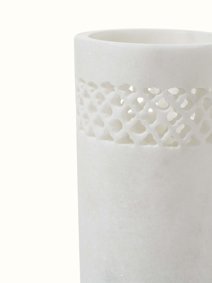 Close-up view of Carved Ambaji white marble toothbrush holder emphasizing the detailed carving and marble quality