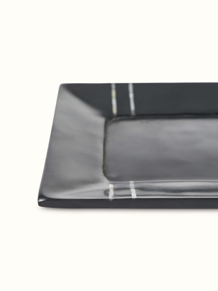 Detailed view of Carved marble stone bath tray in black color showcasing the craftsmanship and finish