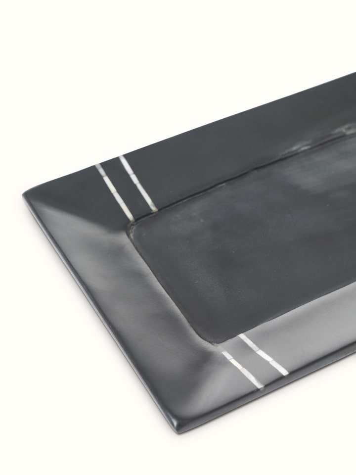 Back view of Carved marble stone bath tray in black color emphasizing the sleek marble design