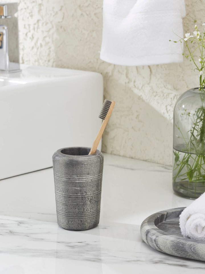 Side view of Carved Marble Toothbrush Holder in Grey color showing its carved details