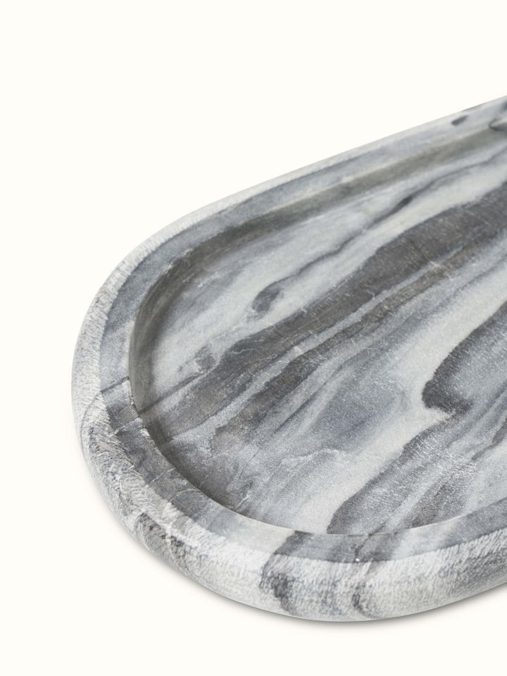Top view of carved marble bath tray in grey color showing its polished finish
