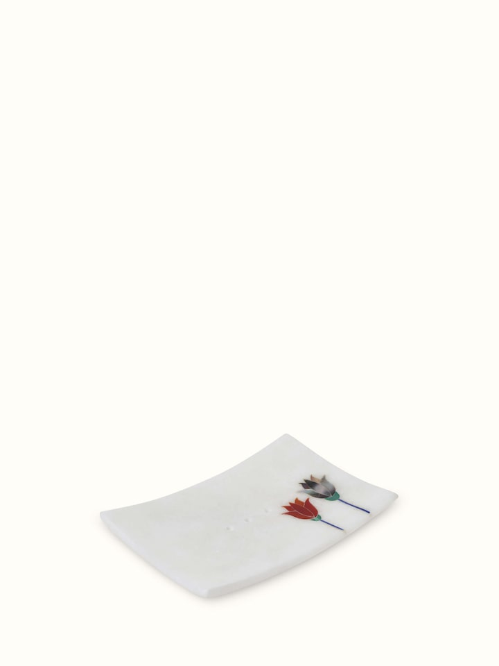 Carved Ambaji white marble lotus soap dish with emphasis on its elegant marble work and design.