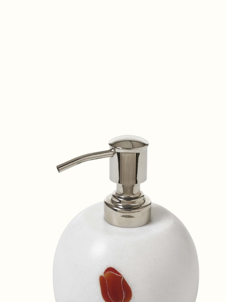 Detailed close-up of carved Ambaji white marble rose soap dispenser focusing on the rose motif