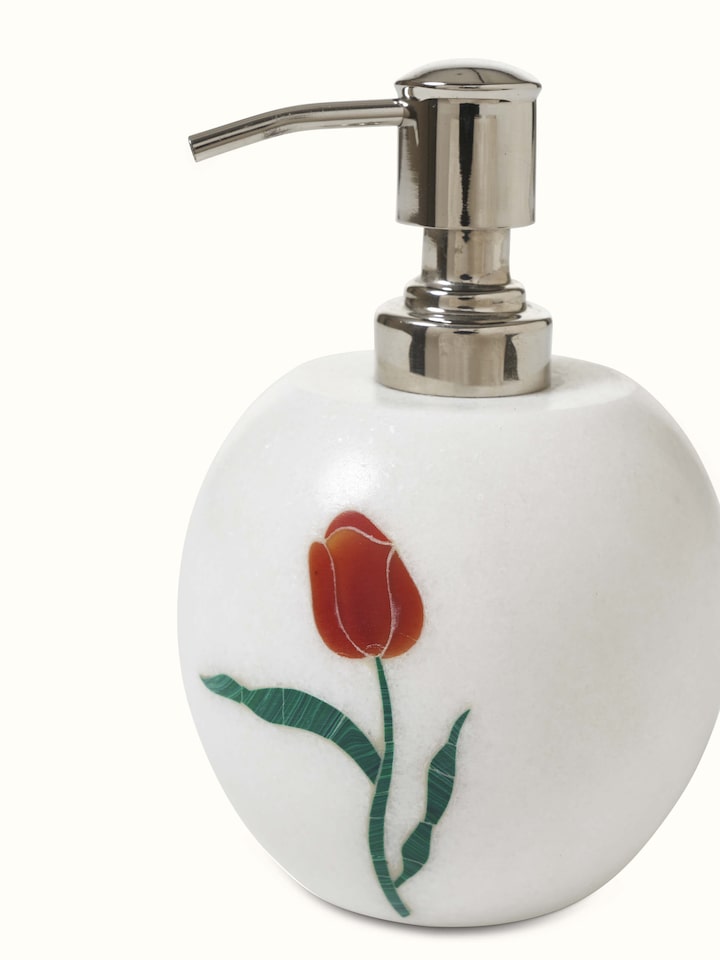 Close-up view of carved Ambaji white marble rose soap dispenser emphasizing its polished finish