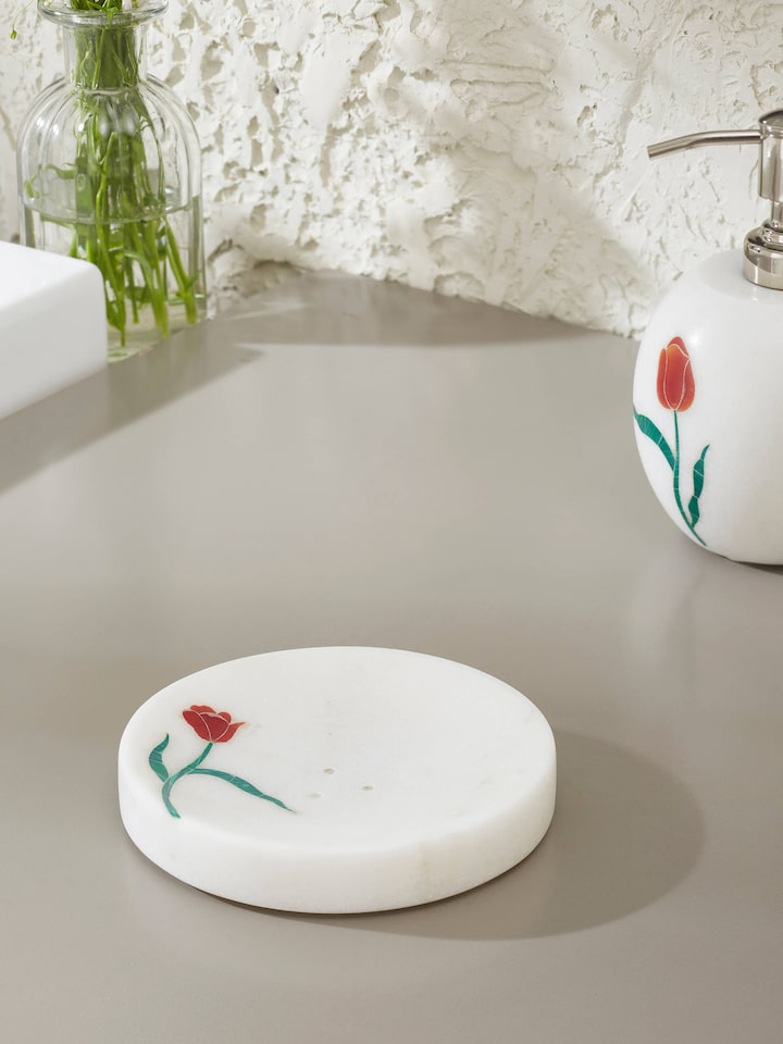 Side view of Carved Ambaji white marble rose soap dish highlighting intricate marble work.