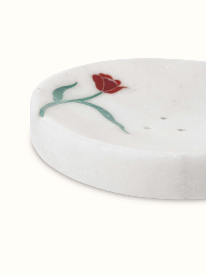 Detailed close-up of Carved Ambaji white marble rose soap dish highlighting craftsmanship.
