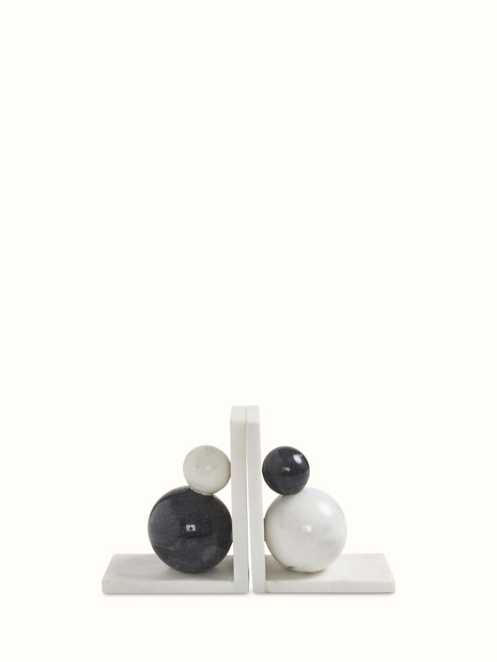 Front view of carved marble bookend in white color displaying its elegant and polished finish