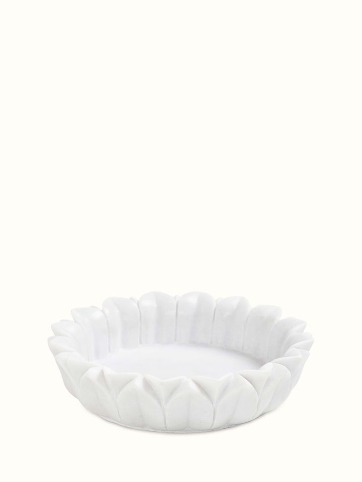 Front view of Glossy Carved Marble Urli showcasing intricate carvings.