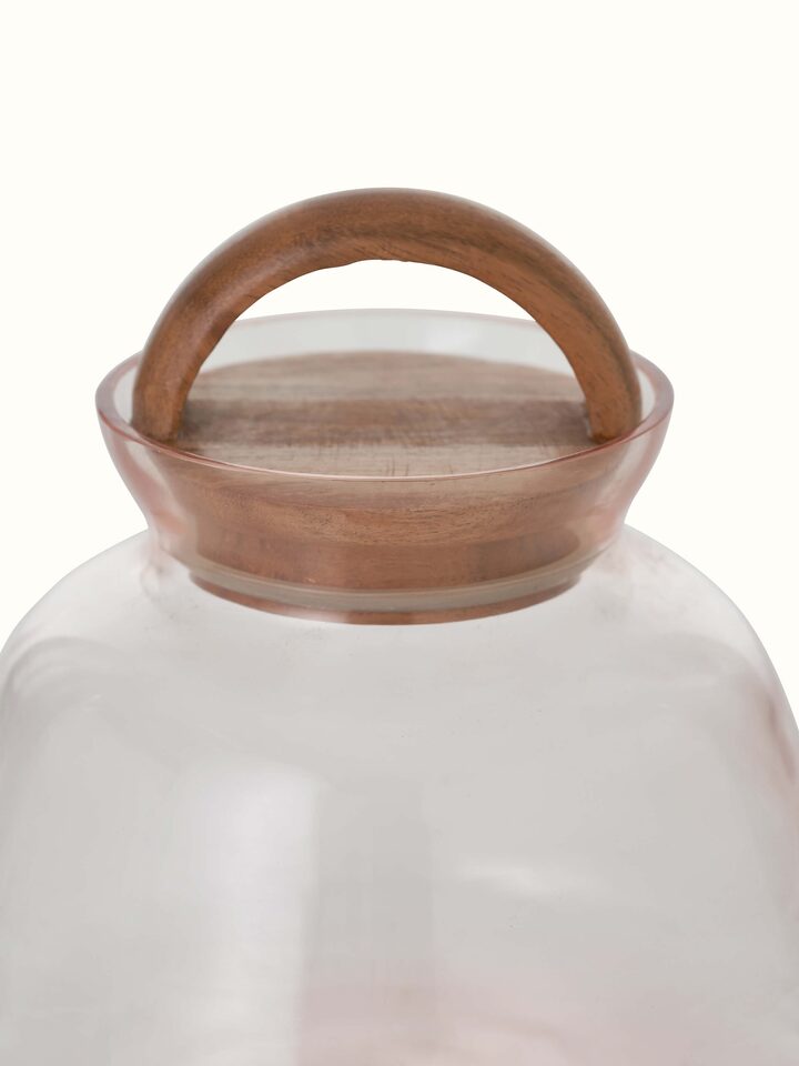 Detailed close-up of pink glass-worked storage container showing the intricate design and craftsmanship